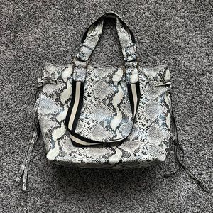 Ahdorned snake leather tote